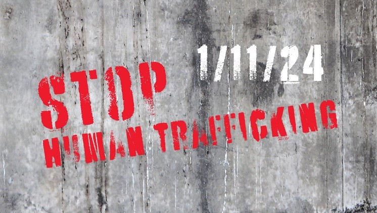 A sign that says stop human trafficking.